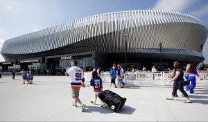 Long Islanders won’t have to travel to Downtown Brooklyn to see their team beginning next season as the Islanders announced Monday that they would be splitting home dates between the Barclays Center and Nassau Coliseum over the next three years. AP Photo by Kathy Willens