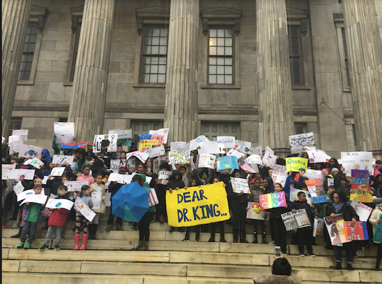 Students from P.S. 261 in Boerum Hill crowd the steps of Borough Hall to honor the legacy of Dr. Martin Luther King Jr. Eagle photo by Kat Ramus