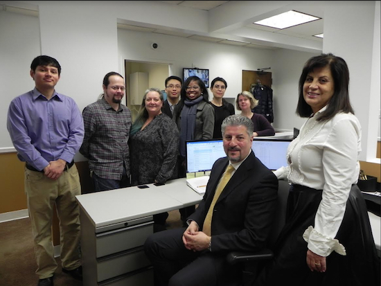 MSI Net President John Abi-Habib (seated) and Office Manager Therese Abi-Habib (right) are excited about the company’s move. They are pictured in their new headquarters with members of their technology staff, Jahaziel Guzman, Lech Lozny, Marialana Ardolino, Alan Qiu, Asia Walton, Fairouz Chelaghma, and Ann Kelly (left to right). Eagle photo by Paula Katinas