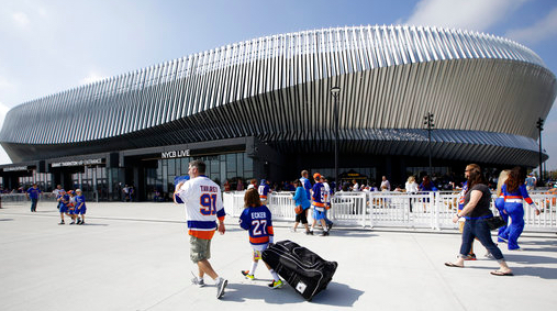 Hockey fans make their way toward the entrances of the renovated Nassau Veterans Memorial Coliseum. AP Photo/Kathy Willens