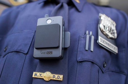 A police officer wears a body camera outside the 34th precinct, Thursday, April 27, 2017, in New York. AP Photo/Mary Altaffer