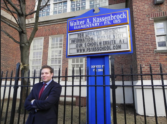 State Senate candidate Ross Barkan, pictured outside his alma mater, P.S. 185 in Bay Ridge, says his education platform will make schools better. Eagle photo by Paula Katinas