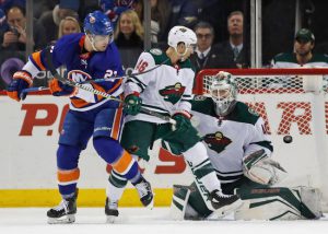 Anders Lee scored his 30th goal of the year on this nifty deflection, but the Islanders saw their two-game winning streak end with a 5-3 loss to Minnesota at Barclays Center on Presidents’ Day. AP Photo by Kathy Willens