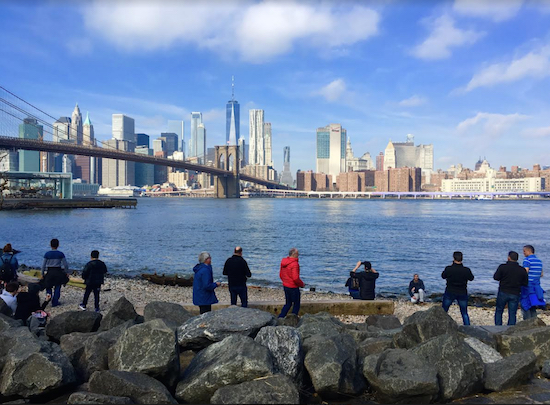 It's soo warm in Brooklyn Bridge Park today. Why are you indoors? Eagle photos by Lore Croghan