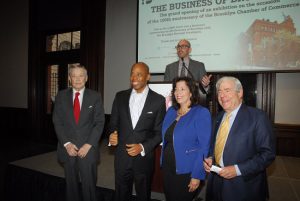 From left: Former Brooklyn Borough President Howard Golden, Brooklyn Borough President Eric Adams, Brooklyn Chamber President and CEO Andrew Hoan (at podium), Chamber board Chairwoman Denise Arbesu and former Brooklyn Borough President Marty Markowitz. Eagle photos by Arthur De Gaeta