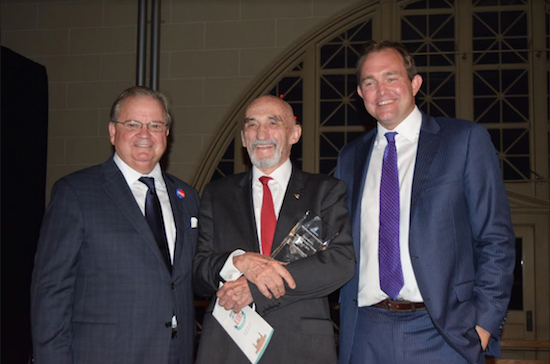 Brooklyn Law School Dean Nick Allard (left) and Brian T. Sullivan (right) presenting professor Richard Farrell (center) with his Icons Gala award in 2015 following his retirement. Eagle file photo by Rob Abruzzese