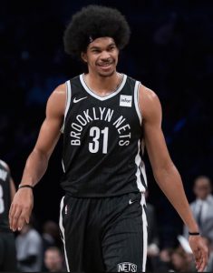 Rookie Jarrett Allen smirks and struts his way back down court after his thunderous jam over Chicago’s Lauri Markannen Monday night made all the sports highlight shows and sparked the Nets to their first win in February. AP photo by Mary Altaffer