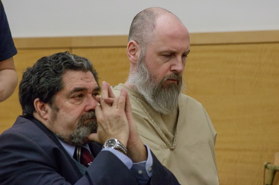 Phillip Martin next to his attorney, David Walensky as his victim’s family gave speech after speech at his sentencing. Eagle photo by Paul Frangipane