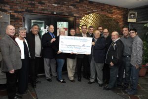 Members of the Rotary Club of Verrazano present $20,000 check to the Guild for Exceptional Children. Eagle photos by Arthur De Gaeta