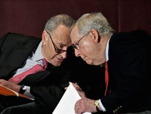 Sen. Chuck Schumer (left) and Sen. Mitch McConnell went head-to-head on Monday over which of their hometowns boasts the best bourbon. AP Photo/Timothy D. Easley