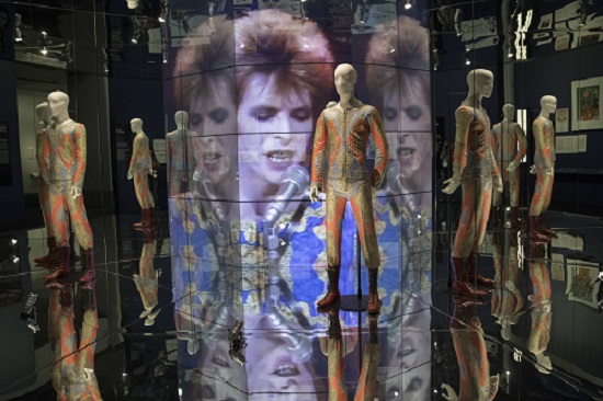 A quilted two piece suit worn for "Starman" performance designed by Freddie Burretti is on display during the media preview of the "David Bowie is" exhibit at the Brooklyn Museum. AP Photo/Mary Altaffer