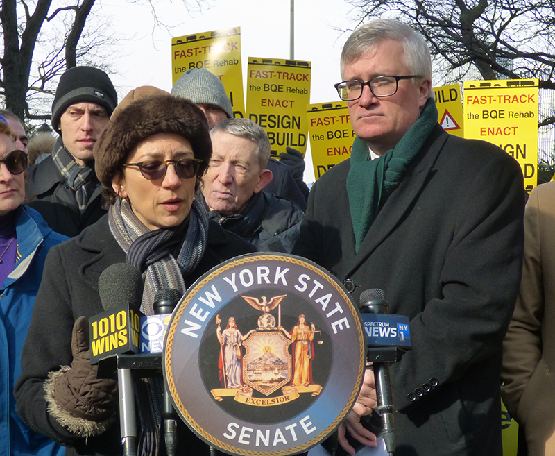 state Sen. Brian Kavanagh, right, at rally in February urging authorization of quicker, cheaper method to carry out $1.8 billion BQE repairs. On the left is city DOT Commissioner Polly Trottenberg. Eagle photo by Mary Frost