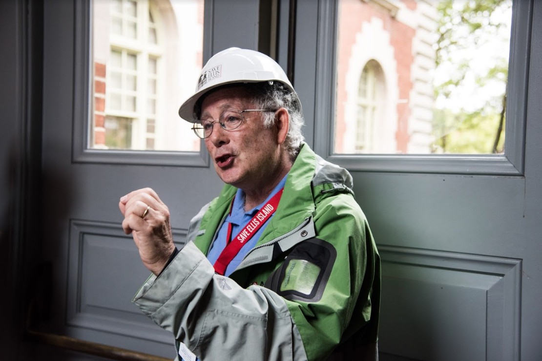 Jim Peskin, senior guide at Ellis Island, speaks to the Eagle’s tour group. 