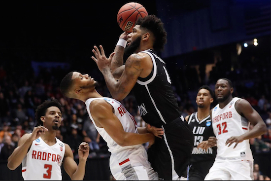 Joel Hernandez carried the LIU Brooklyn Blackbirds to the NCAA Tournament, but was unable to get past Radford’s tenacious defense Tuesday night in Dayton, Ohio. AP Photo by John Minchillo