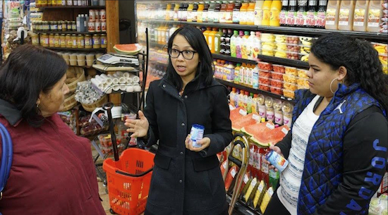 Dr. Mary Kristine Ellis (center) turned a grocery store into a doctor’s office one recent afternoon to explain to patients on how to make healthier food choices. Photo courtesy of NYU Langone Hospital – Brooklyn