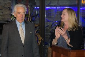 Past President Ray Ferrier, of the Bay Ridge Lawyers Association, will be named a "fellow" during its next annual holiday party. Pictured is BRLA President Margaret Stanton giving the news to Ferrier.
