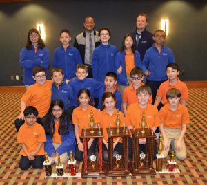 Students and teachers from several Success Academy Charter Schools proudly display the trophies they earned at a recent chess tournament in Saratoga Springs. Photo courtesy of Success Academy