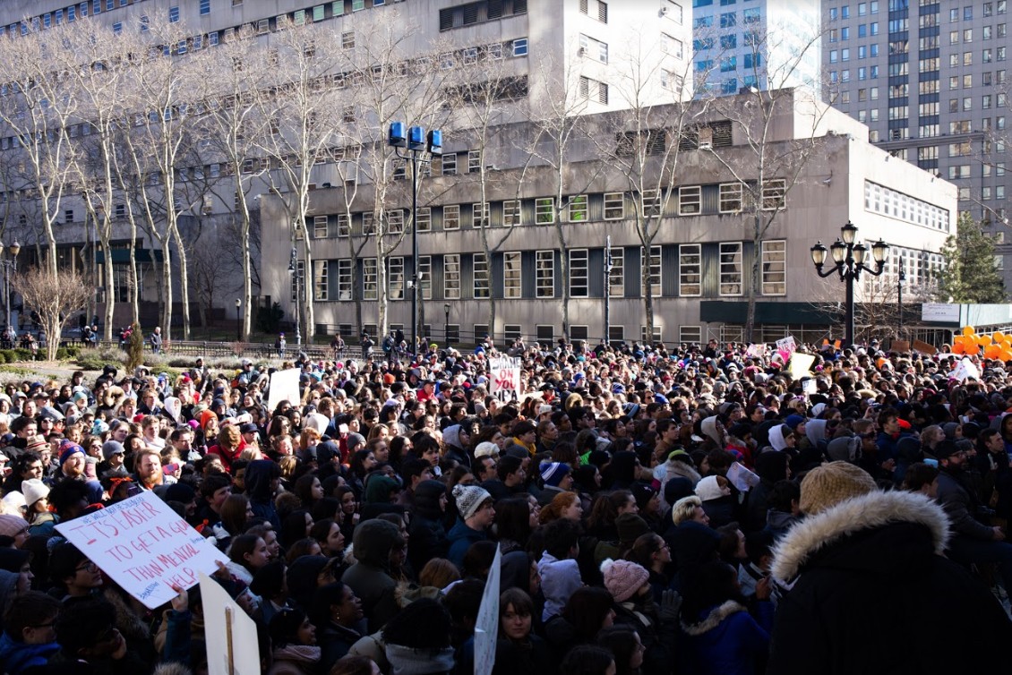 The rally took place on the steps of Borough Hall just outside of the Kings County Supreme Court, Civil Term (pictured in the background).