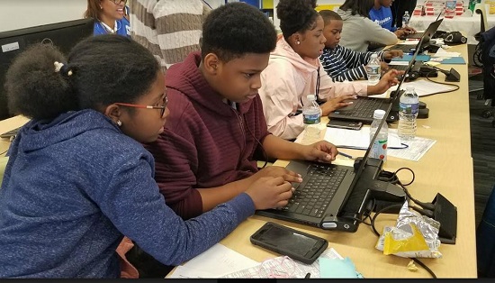 Teens worked on teams to create apps to promote strong communities during the day-long technology fair at Medgar Evers College. Photo courtesy of state Sen. Jesse Hamilton’s office