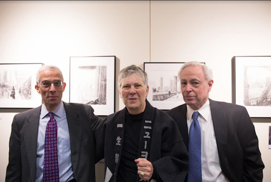 Retired FDNY captain and 9/11 first responder Brenda Berkman poses with her lawyer Jonathan Richman (left) and Stanley Kessler (right) during the opening of her gallery titled, "Lawyer to Firefighter to Artist: the Evolution of Brenda Berkman.” Eagle photos by Edward King