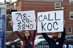 NRA supporters gathered in Dyker Heights on Thursday night and were met with protesters, including these anti-gun activists who gave out the Knights of Columbus phone number.