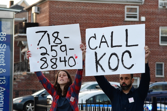 NRA supporters gathered in Dyker Heights on Thursday night and were met with protesters, including these anti-gun activists who gave out the Knights of Columbus phone number.
