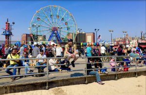 There will be a public hearing on Tuesday about landmarking the Coney Island Boardwalk, which was crowded with visitors on sunshiny Saturday, April 14. Eagle photos by Lore Croghan