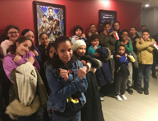 These lucky kids got to see “Black Panther,” the movie everyone is talking about. Photo courtesy of Good Shepherd Services