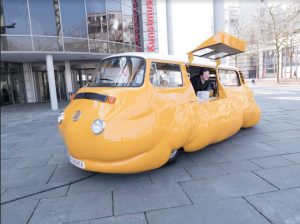 Artist Erwin Wurm’s “Hot Dog Bus,” a modified, vintage Volkswagen Microbus that has been transformed into a bloated and bizarre hot dog stand is coming to Brooklyn Bridge Park this summer. Photo courtesy of Studio Erwin Wurm, Bonn 2017
