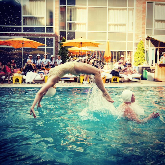 Jen K. Norton performs a somersault during a recent performance of the Brooklyn Peaches Synchronized Swimming Troupe. Photo courtesy of the Brooklyn Peaches