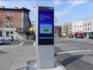 The plan calls for Link kiosks all over the city, including this one on Fourth Avenue near 33rd Street in Sunset Park, to display information on when buses are expected to arrive at bus stops within walking distance. Eagle file photo by Paula Katinas