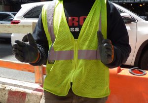 A worker at the 189 Montague St. construction site holds his arms out to indicate the size of a very large rat he saw while on the job. Eagle photo by Mary Frost
