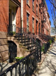 There’s a $6,600 per month duplex for rent at 239 Front St., the rowhouse whose stoop is seen at left. Eagle photos by Lore Croghan