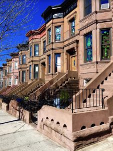 Sunset Park's housing stock includes hundreds of landmark-worthy, century-old rowhouses, like these on 50th Street. Eagle file photo by Lore Croghan