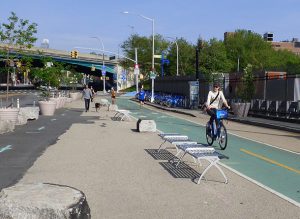 Residents in Stephen Levin’s City Council district voted to fund an upgrade to the temporary bike path connecting Brooklyn Bridge Park to Columbia Street, shown above, in this year’s round of participatory budgeting. Photo by Mary Frost