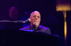 Billy Joel. Photo by Michael Zorn/Invision/AP