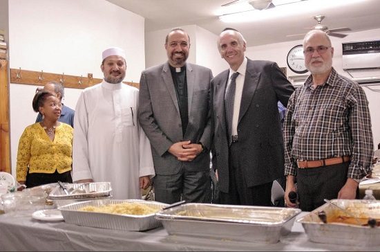 Members of Brooklyn's Muslim, Jewish and Christian communities gathered at a 2016 interfaith iftar dinner. Left to right: Carmen Catalino, Imam Abdallah Allam, Pastor Khader El-Yateem, Douglas Jablon and Dr. Ahmad Jaber. Eagle file photo by Francesca N. Tate
