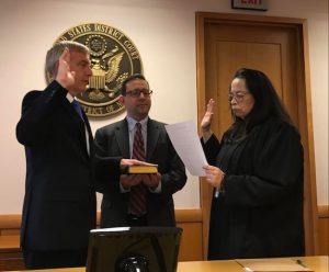 Richard P. Donoghue was sworn in as United States Attorney for the Eastern District of New York at the federal courthouse in Brooklyn on Friday by Chief Judge Dora L. Irizarry after his appointment by the Court. Criminal Division Chief Seth DuCharme holds the Bible. Photo courtesy of the U.S. Attorney for the EDNY