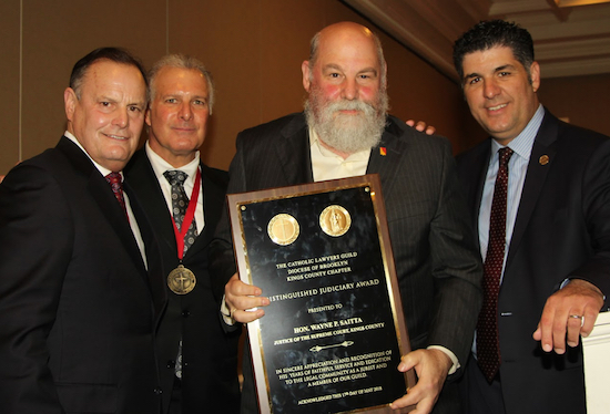 The Catholic Lawyers Guild of Kings County honored five members of Brooklyn’s legal community, including Justice Wayne Saitta (second from right), during a ceremony on Thursday. Pictured from left: Gregory M. LaSpina, Gregory Cerchione, Hon. Wayne P. Saitta and President Dominic Famulari. Eagle photos by Mario Belluomo