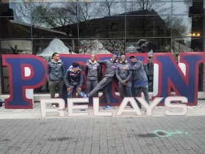 From left to right, Matthew Nieves, Daniel Pagan, Joshua Beausil, Feguy Magnan and team captain Paul Clarke get the thumbs up from head coach Christopher Mills after SFC-Brooklyn won a 4x400 heat last weekend during the prestigious Penn Relays in Philadelphia. Photo courtesy of SFC Brooklyn Athletics