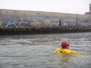 Clean water activist Chris Swain has swum some of America’s most toxic waterways, including the Gowanus Canal three times. Yet out of all of his plunges, Newtown Creek was the most horrifying, he said.   Photo courtesy of Chris Swain