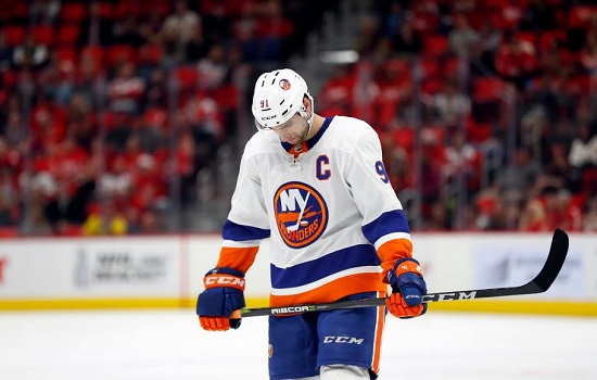 John Tavares, shown here during what may have been his final game as an Islander in Detroit last month, will be an unrestricted free agent for the first time on July 1 after nine brilliant campaigns with New York. AP photo by Paul Sancya