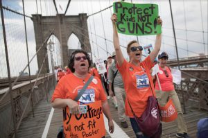 Demonstrators chant slogans as they march over the Brooklyn Bridge. AP Photos/Mary Altaffer