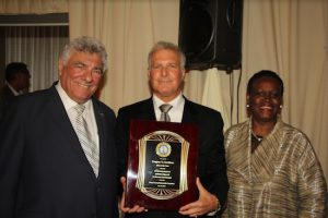 Hon. Frank R. Seddio (left) and the Kings County Democratic Party Committee honored Gregory T. Cerchione (center) and two others during its annual gala. Also pictured is former Assemblymember Annette Robinson, who presented Cerchione with the Man of the Year Award. Eagle photos by Mario Belluomo