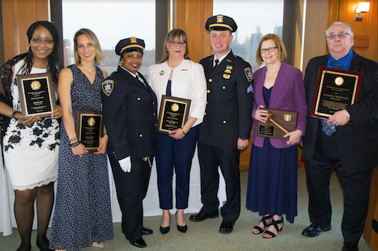 The Kings County Housing Court Bar Association hosted its 17th annual awards luncheon where five were honored. Pictured from left: Tanya Faye, Hon. Heela Capell, Lt. Tawya Young, Maryann Fitzgerald, Frank Shea, Hon. Jean Schneider and Michael Rosenthal. Eagle photos by Rob Abruzzese
