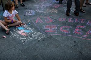 Equipped with a box of chalk, children decorated the pavement outside Borough Hall with messages against the federal government’s decision to separate immigrant families at the border with Mexico. Eagle photos by Paul Frangipane