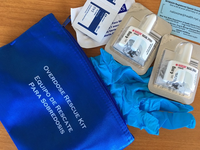 Participants in an overdose prevention training session at the Bushwick Library on Tuesday received an opioid overdose rescue kit with naloxone (also called Narcan).  Eagle photo by Mary Frost