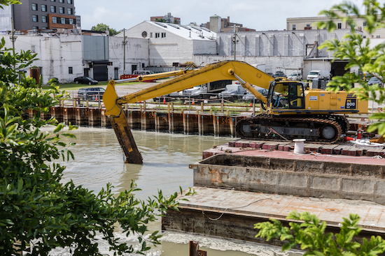 EPA began the last phase of its dredging and capping pilot project on Monday, the third and final study before the actual cleanup of the Gowanus Canal commences. Eagle photos by Paul Frangipane