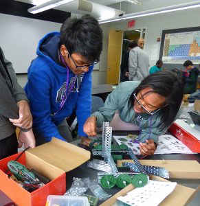 Students are immersing themselves in hot tech topics like cyber security and robotics at NYU Tandon’s Downtown Brooklyn campus this summer. Shown: High school students building working clawbots as part of the ITEST Robotics and Entrepreneurship program. Eagle photo by Mary Frost
