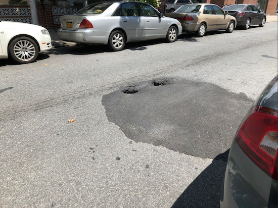 A sinkhole in the making resurfaced on 88th Street on Monday, July 30. Eagle photo by Jaime DeJesus